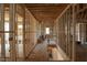 Interior framing showing stairwell and hallway of a new construction home at 7436 Summer Tanager Trl, Raleigh, NC 27614