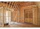 Interior framing showing unfinished attic with wood beam construction and flooring at 7436 Summer Tanager Trl, Raleigh, NC 27614