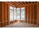 New construction featuring window framing offering natural light and views in the room at 7436 Summer Tanager Trl, Raleigh, NC 27614