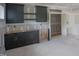 Spacious kitchen featuring shaker cabinets, stainless steel appliances, and ample counter space at 7436 Summer Tanager Trl, Raleigh, NC 27614