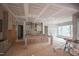 Spacious kitchen featuring a large center island with ample cabinet storage at 7436 Summer Tanager Trl, Raleigh, NC 27614