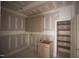 Laundry room with cabinets and storage at 7436 Summer Tanager Trl, Raleigh, NC 27614