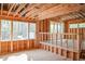 Unfinished room featuring natural light from windows showing framing in the construction phase at 7436 Summer Tanager Trl, Raleigh, NC 27614