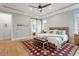 Spacious main bedroom suite with en-suite bath and light-filled windows at 749 Golfers Vw, Pittsboro, NC 27312
