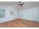 Spacious main bedroom with vaulted ceiling and large window for natural light at 8000 Elderson Ln, Raleigh, NC 27612