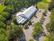 Overhead shot of a tennis facility with an indoor court, swimming pool, and ample parking at 812 Northclift Dr, Raleigh, NC 27609