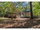 Spacious backyard with a wooden deck, perfect for outdoor gatherings and activities at 812 Northclift Dr, Raleigh, NC 27609