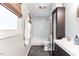 Modern bathroom with sleek black tile floors and a shower with a tub at 812 Northclift Dr, Raleigh, NC 27609