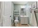 Lovely bathroom with a toilet, sink and vanity, and decorative artwork at 812 Northclift Dr, Raleigh, NC 27609