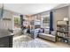 Cozy ' bedroom featuring bunk beds, a window, and a gray rug at 812 Northclift Dr, Raleigh, NC 27609