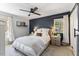 Serene bedroom featuring a board and batten accent wall, neutral colors, and bright natural light at 812 Northclift Dr, Raleigh, NC 27609