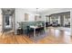 Charming dining area with custom banquette seating, wood floors, and a view to the living room at 812 Northclift Dr, Raleigh, NC 27609