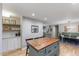 Open kitchen layout showcasing a butcher block island with cabinets and an adjacent dining area at 812 Northclift Dr, Raleigh, NC 27609