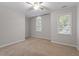 Bright bedroom with a ceiling fan and windows bringing in natural light at 903 Norwood Lane Ln, Apex, NC 27502