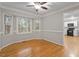 Bright dining area featuring hardwood floors, three windows and white trim at 903 Norwood Lane Ln, Apex, NC 27502