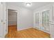 Bright dining area with hardwood floors and a door to the outside at 903 Norwood Lane Ln, Apex, NC 27502