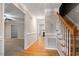 Spacious entryway featuring hardwood floors, a staircase, and views into other rooms at 903 Norwood Lane Ln, Apex, NC 27502