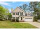 Charming two-story home with a well-manicured lawn and inviting curb appeal at 903 Norwood Lane Ln, Apex, NC 27502