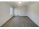 This bedroom offers natural light and ample closet space at 91 Paige Stone Way, Angier, NC 27501