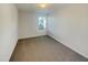 This bedroom has neutral walls, carpet, and natural light at 91 Paige Stone Way, Angier, NC 27501