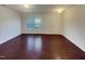 Spacious living room with natural light, offering a blank canvas for your personal touch at 91 Paige Stone Way, Angier, NC 27501