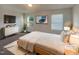 Serene primary bedroom with calming colors, large windows, and a cozy rug at 91 Paige Stone Way, Angier, NC 27501