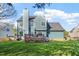 Expansive backyard featuring a well-maintained lawn and a charming wooden deck for outdoor relaxation at 9204 Cub Trl, Raleigh, NC 27615