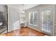 Cozy breakfast nook with a built-in desk, large windows, and ample natural light at 9204 Cub Trl, Raleigh, NC 27615