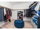 Well-organized walk-in closet with shelving and hanging rods for ample storage at 936 Regency Cottage Pl, Cary, NC 27518