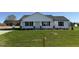 Inviting single-story home with a manicured lawn and appealing traditional facade at 99 Pate Landing Dr, Selma, NC 27576