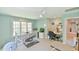 Upstairs exercise room with ceiling fan, desk area and plentiful natural light at 104 Buckeye Ln, Chapel Hill, NC 27516