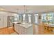 Well-appointed kitchen with an island, stainless appliances, and a breakfast nook nearby at 104 Buckeye Ln, Chapel Hill, NC 27516