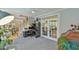 Home office with stairs, built-in desk, and French doors at 104 Buckeye Ln, Chapel Hill, NC 27516