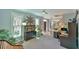 Spacious home office with a sun decoration, hardwood floors and a ceiling fan at 104 Buckeye Ln, Chapel Hill, NC 27516