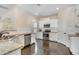 Kitchen with white cabinets and stainless steel appliances at 104 Lowe Wood Ct, Durham, NC 27703