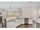 Granite countertops and stainless steel appliances in a bright, open kitchen at 104 Lowe Wood Ct, Durham, NC 27703