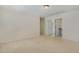 Expansive loft with doorways to bathroom, neutral carpet, and plenty of natural light at 104 Lowe Wood Ct, Durham, NC 27703