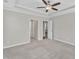 Spacious bedroom featuring a ceiling fan and neutral carpet at 1077 Williams-White Rd, Zebulon, NC 27597