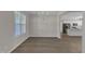 Bright dining area features hardwood floors, white trim, a modern chandelier, and lots of natural light at 1077 Williams-White Rd, Zebulon, NC 27597