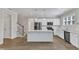 Beautiful kitchen with stainless steel appliances, granite countertops, and a large island at 1077 Williams-White Rd, Zebulon, NC 27597