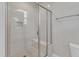 Modern shower with glass enclosure and built-in seat at 1077 Williams-White Rd, Zebulon, NC 27597