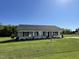 Charming single-story home with well-maintained lawn and inviting front porch, creating a welcoming curb appeal at 108 Pate Landing Dr, Selma, NC 27576