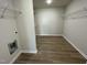 Spacious walk-in closet with vinyl floor and wire shelving on three sides at 108 Pate Landing Dr, Selma, NC 27576