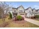 Charming townhouse featuring a well-maintained yard and inviting curb appeal at 1103 Kudzu St, Durham, NC 27713