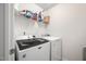 Laundry room featuring modern washing and drying machines at 1103 Kudzu St, Durham, NC 27713