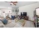 Comfortable living room featuring a ceiling fan and stylish decor at 1103 Kudzu St, Durham, NC 27713