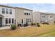 Cozy backyard patio with comfortable seating and a grill, ideal for outdoor entertaining at 1103 Kudzu St, Durham, NC 27713
