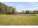 Community playground with swings and slides, offering a fun space for children to play at 1103 Kudzu St, Durham, NC 27713
