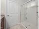 Bathroom stall showcasing glass doors and tiled floors at 1103 Kudzu St, Durham, NC 27713