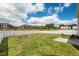 Large fenced backyard with a patio and seating, offering privacy and space for outdoor enjoyment at 1110 Bent Willow Dr, Durham, NC 27704